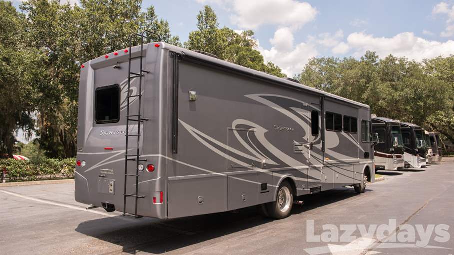 The 2016 Winnebago Sightseer luxury Class A motorhome features new stardard high-efficiency A/C units with heat pumps.